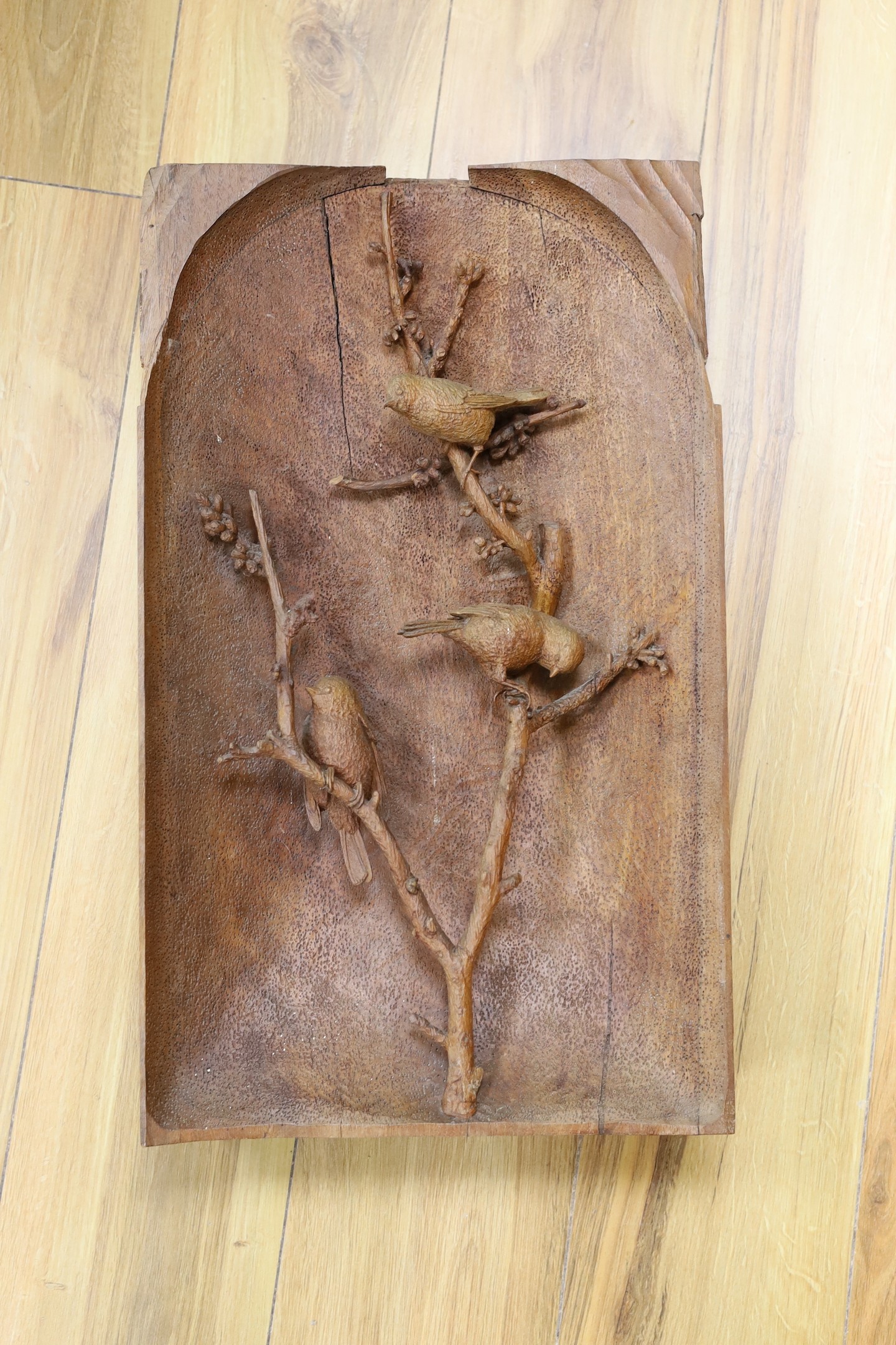A large alpine wood carving - three birds, one detached section, 31 cms x 52 cms